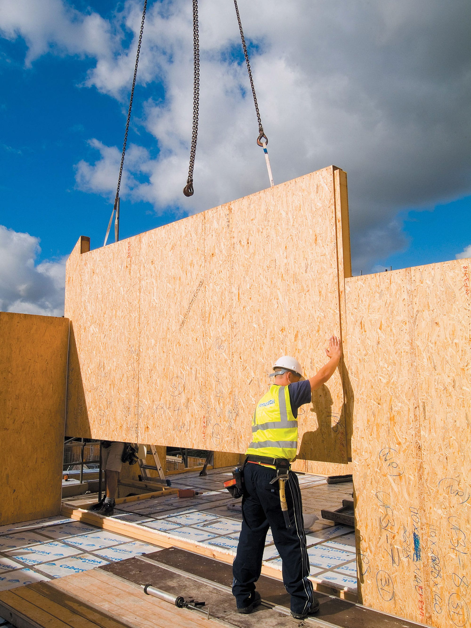 SIPs structural system being lowered into place 