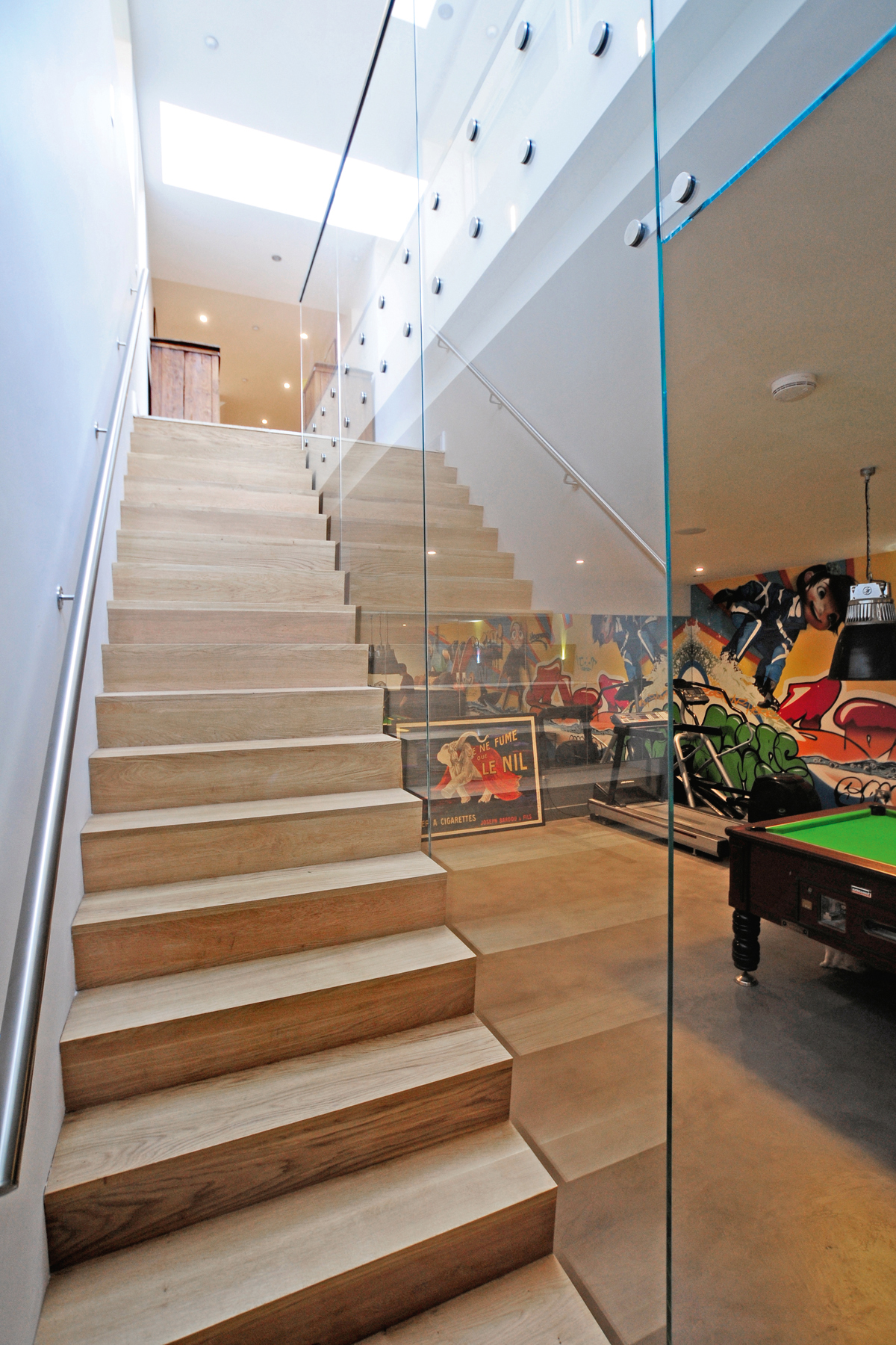 Glass balustrade on staircase leading to basement