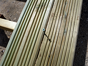Lay the decking in sequence, starting from one end