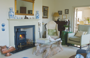 Cottage renovation and extension with render and timber cladding