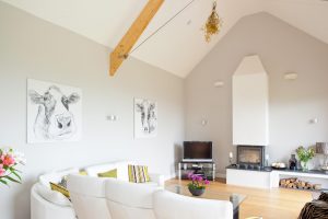 Contemporary timber frame home with stone walls