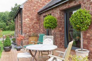 Contemporary timber frame home with stone walls