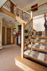 Carpeted timber staircase by Neville Johnson