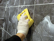 Wipe off excess grout