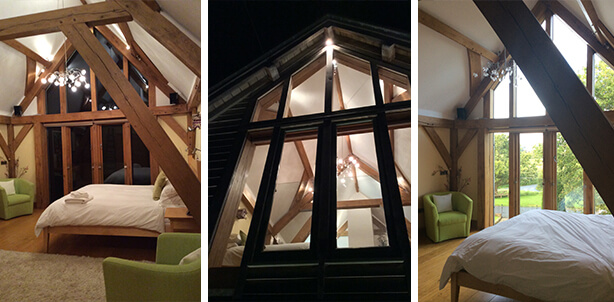 The master bedroom with vaulted ceilings and oak beams