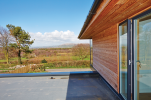 Self-Build Home with Larch-Clad Cantilever
