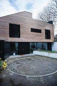 Contemporary shop conversion with timber cladding