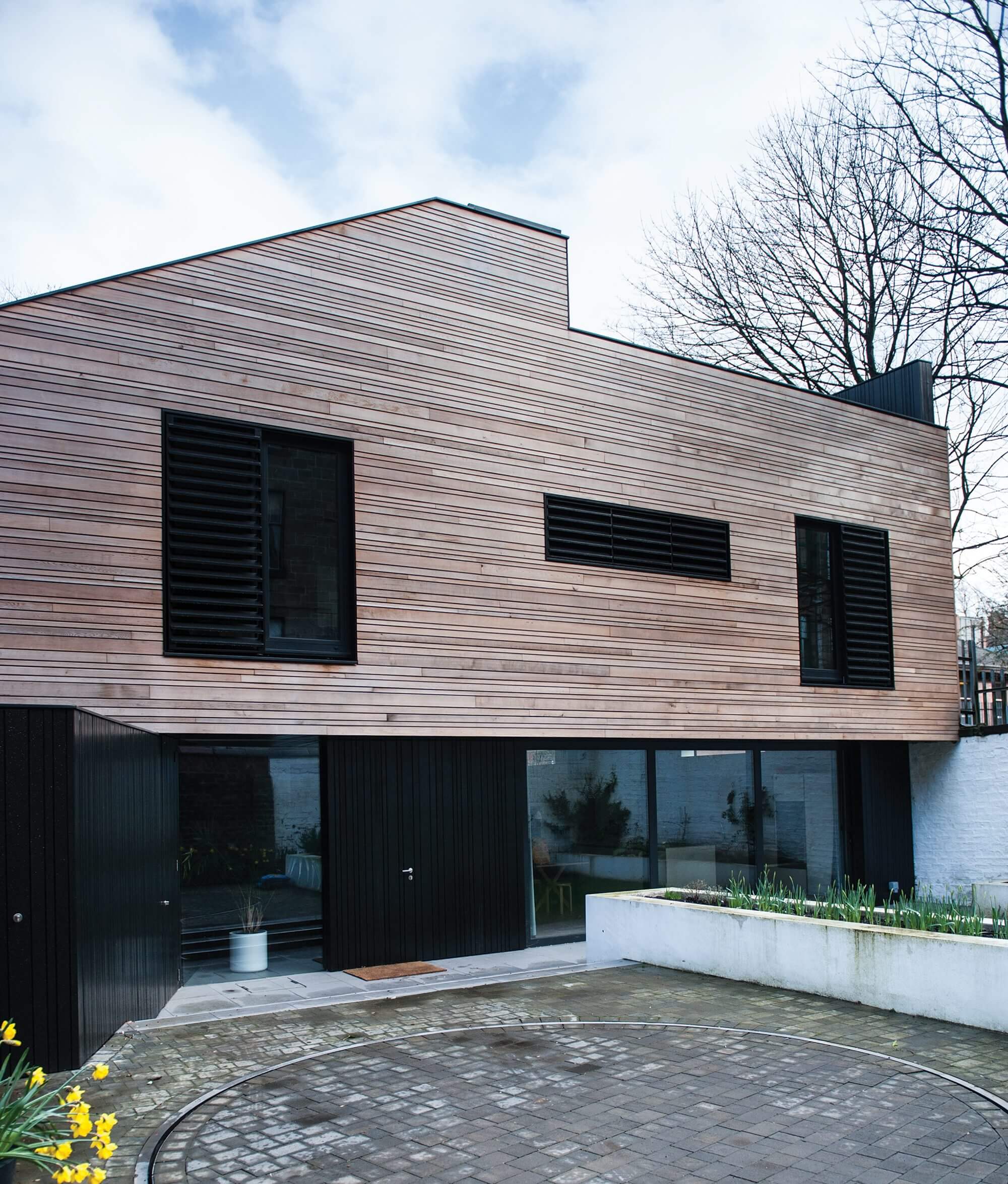 Contemporary shop conversion with timber cladding