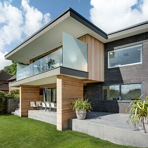 Four Views masonry home by AR Design Studio