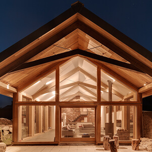 Marshall oak frame extension by Carpenter Oak
