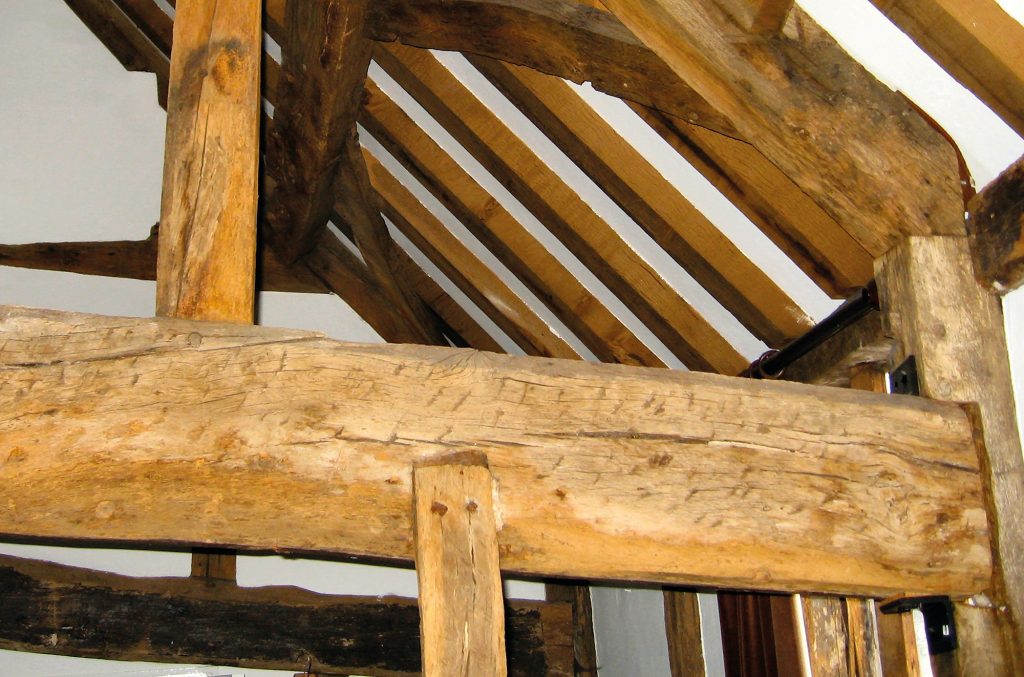 Exposed trusses in period home