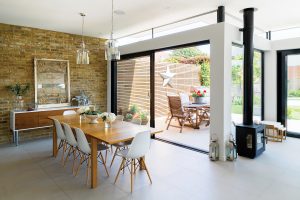 Arts and Crafts home with steel frame extension