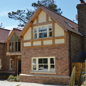 timber frame and brick house