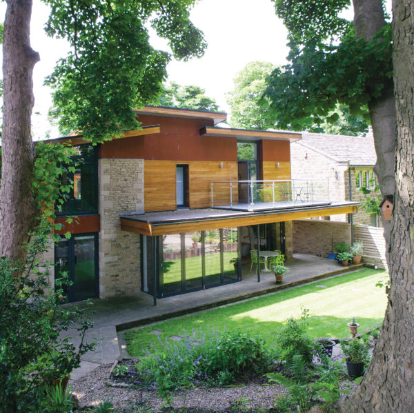 Contemporary stone and cedar self-build