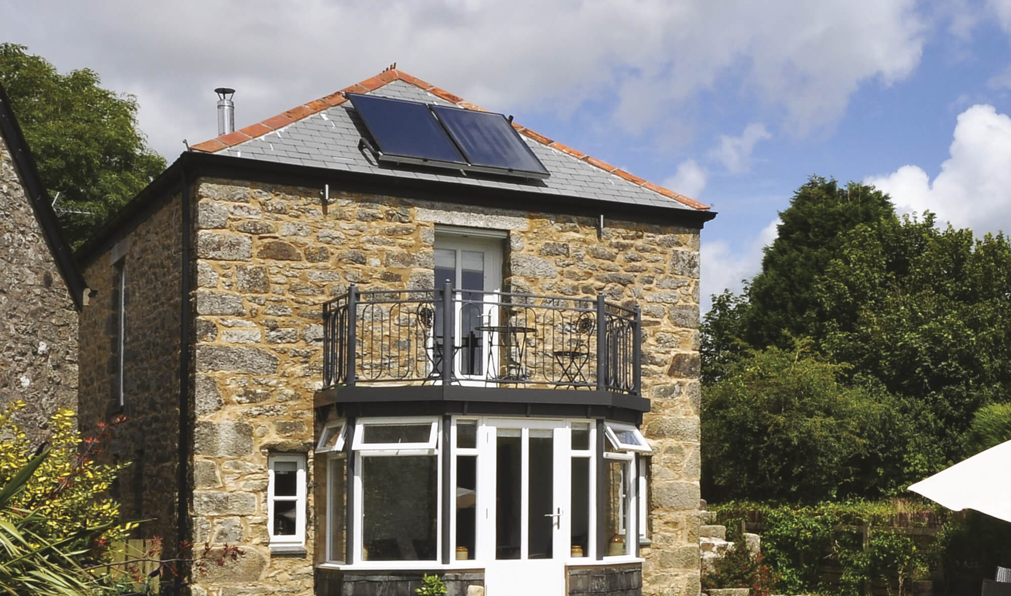 Solar thermal hot water panels on a barn conversion