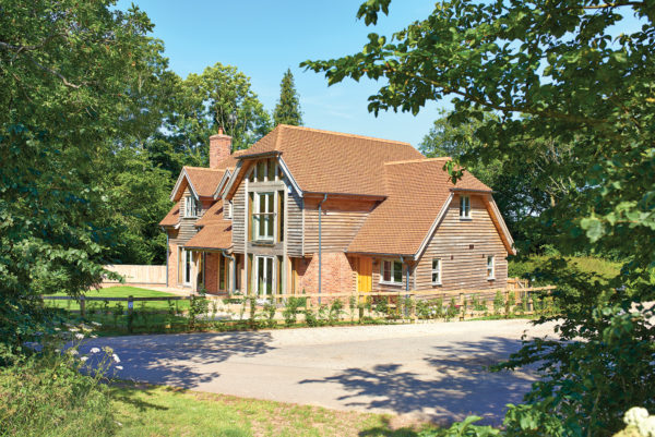 Traditional oak frame and brick home