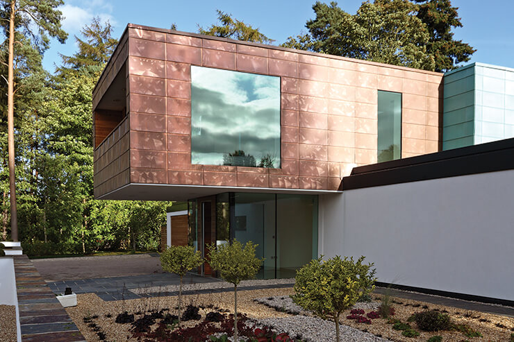 contemporary home with copper cladding