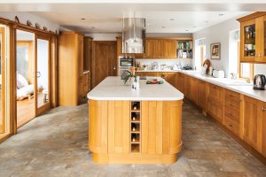 Contemporary barn clad with stone and ThermoWood