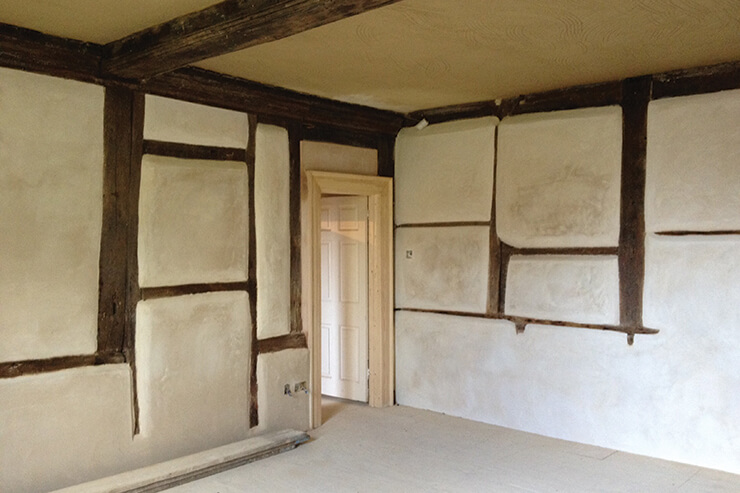 lime plastered timber frame room