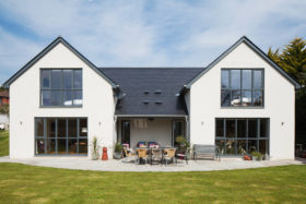 white rendered timber frame home