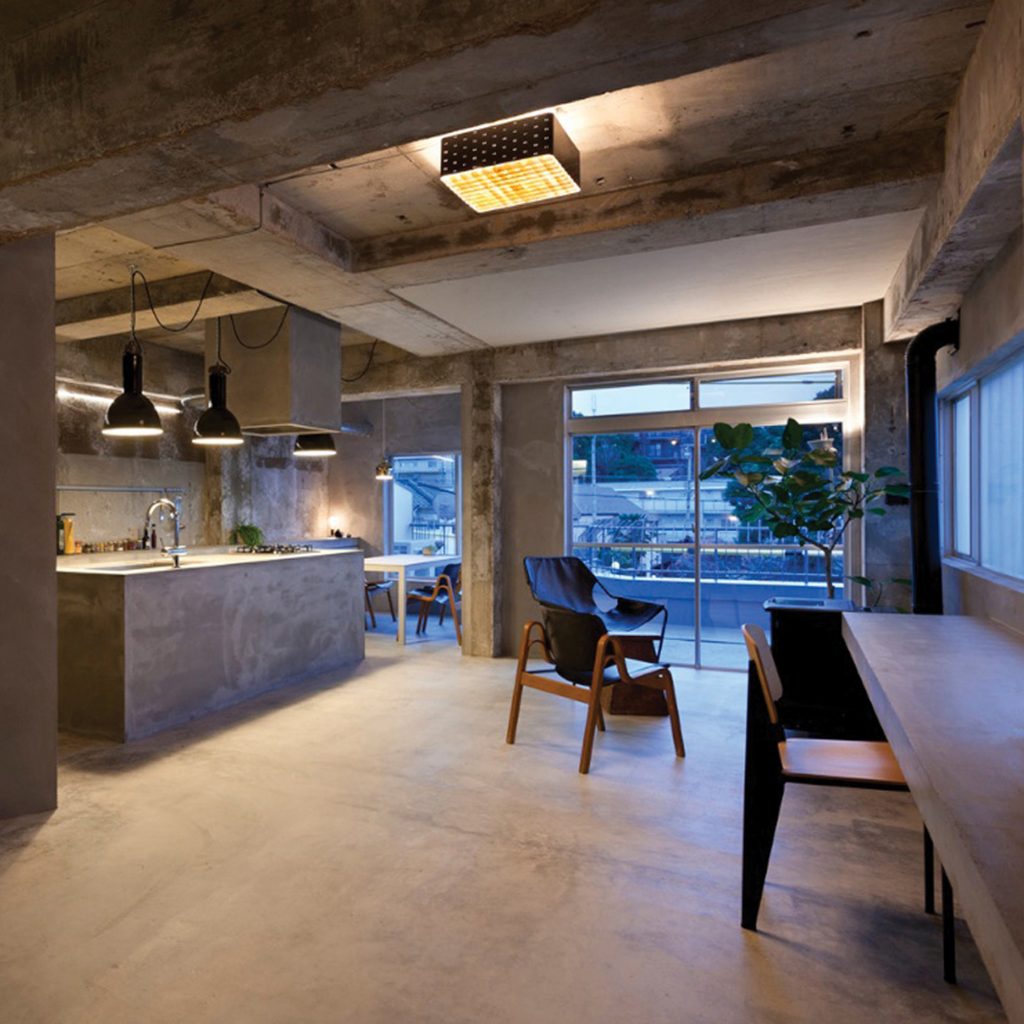 Industrial polished concrete room by Skinflint Design