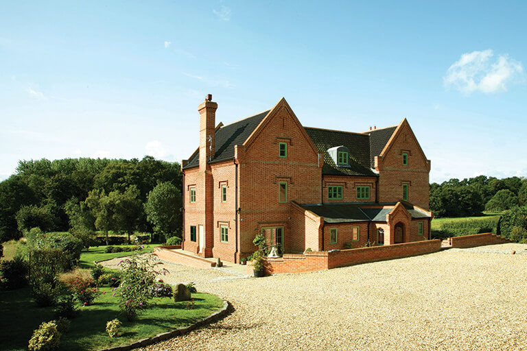 traditional brick and flint self build manor