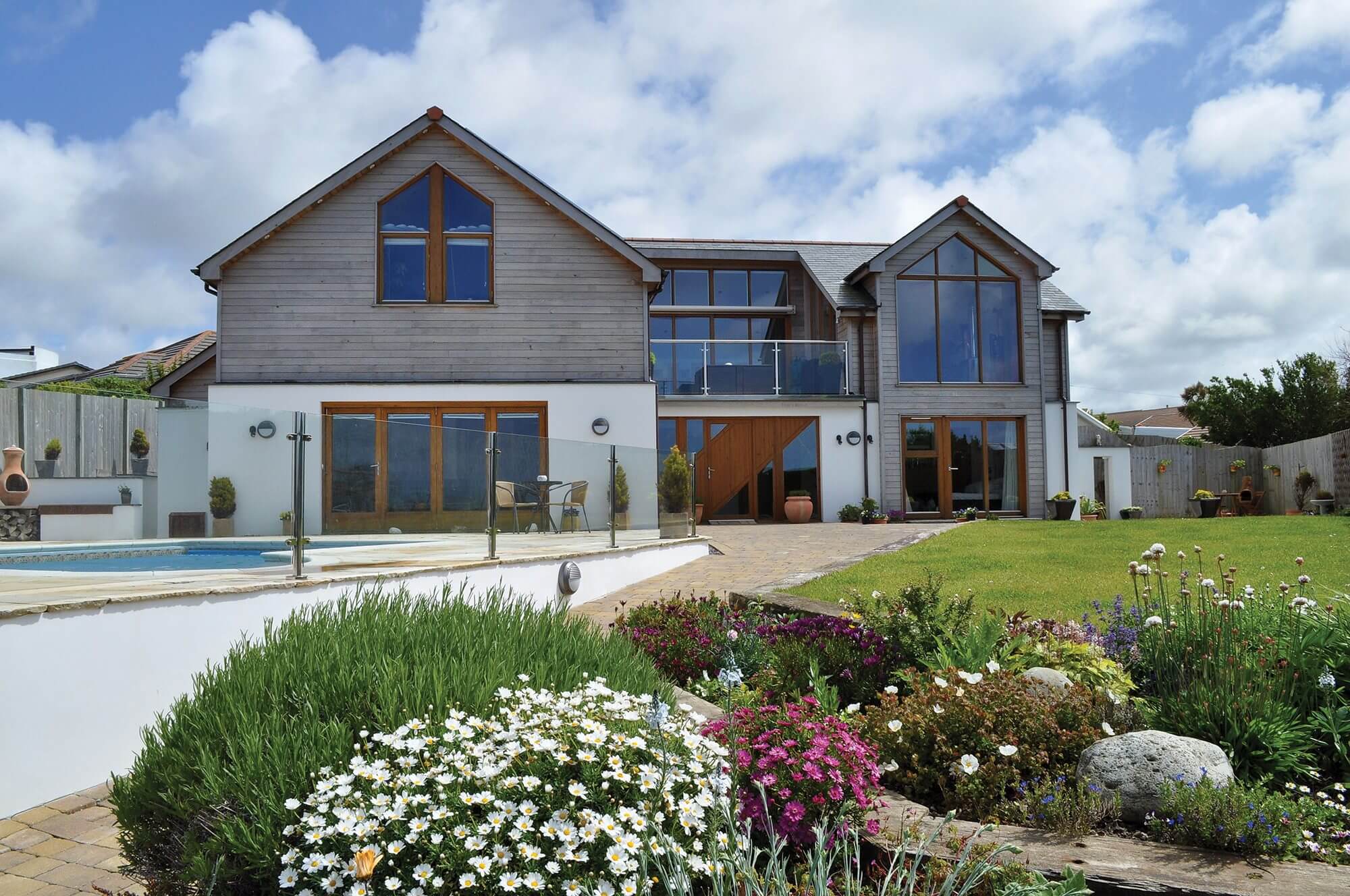 timber frame house with large windows