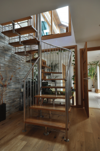 Wooden spiral staircase with metal balustrades