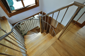 Wooden spiral staircase with metal balustrades