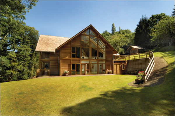 timber frame home on sloping plot