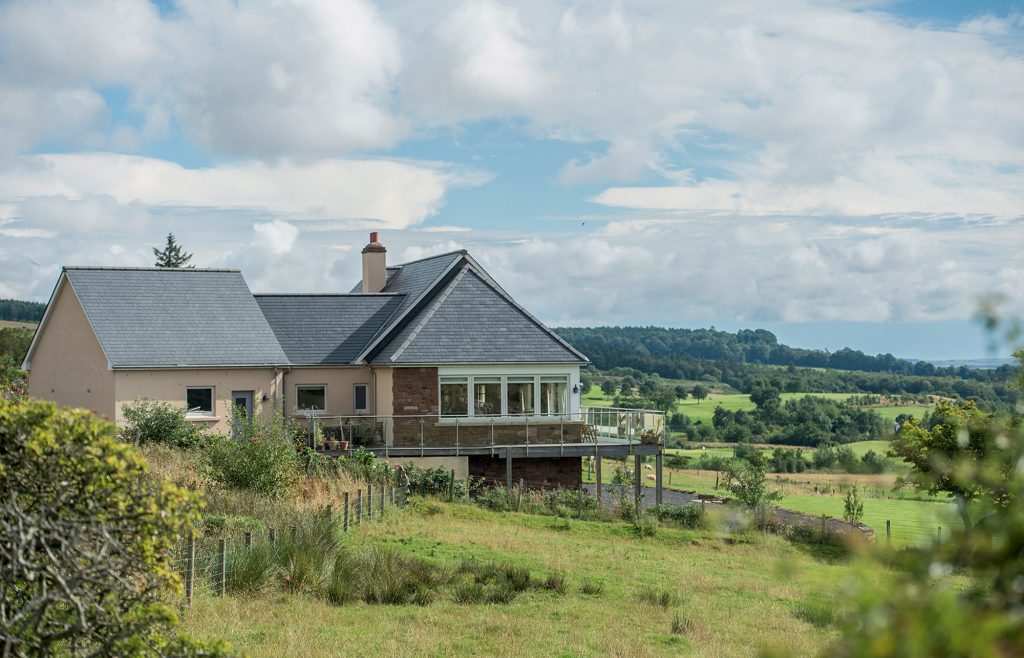 Home on a sloped site by Fleming Homes