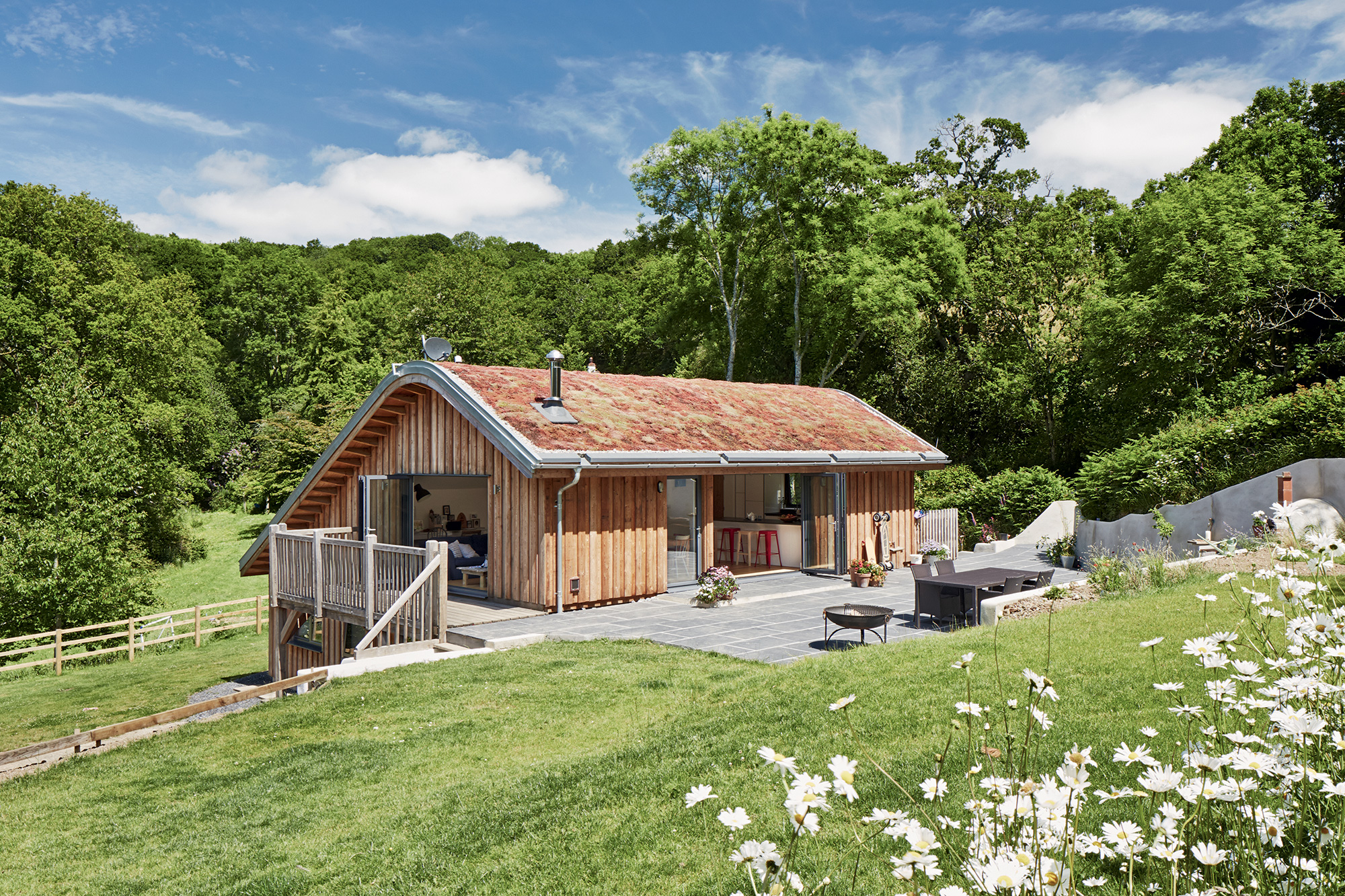 Home on a sloping site by Living Space Architects