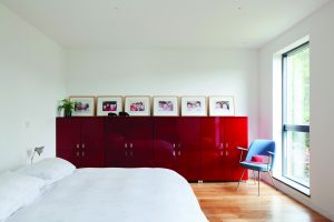 Master bedroom with orange cabinets