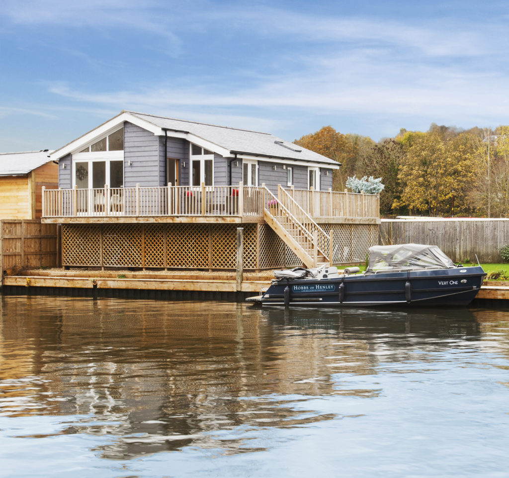 New England style riverside self build home