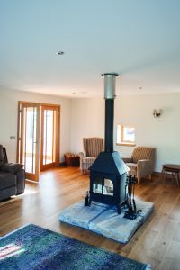 Large living area with wood burning stove