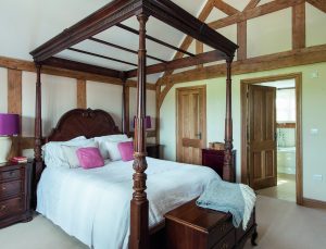 Classic master bedroom with four poster bed