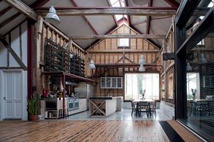 The conversion of this 18th century threshing barn, dairy and stables in Kent by Liddicoat & Goldhill has created a modern home that combines its heritage with chic industrial details. Photo: Keith Collie
