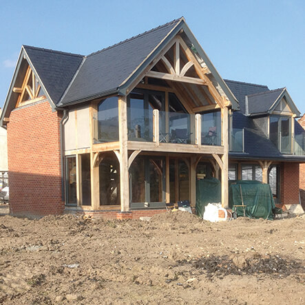 brick clad oak frame home