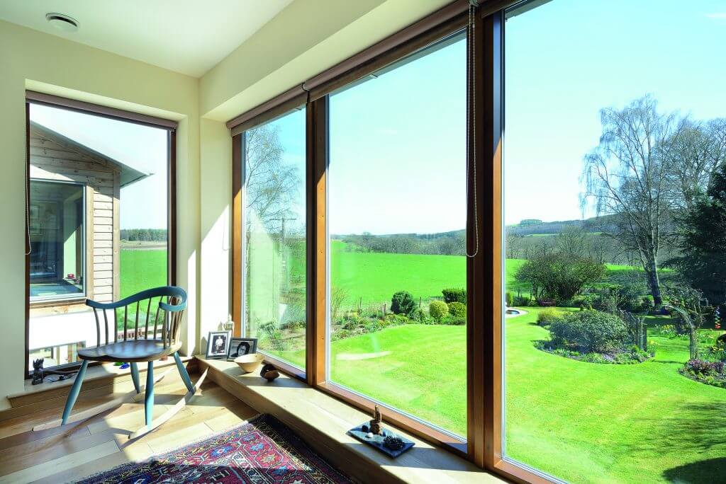 Wide glazing looking over rural landscape 