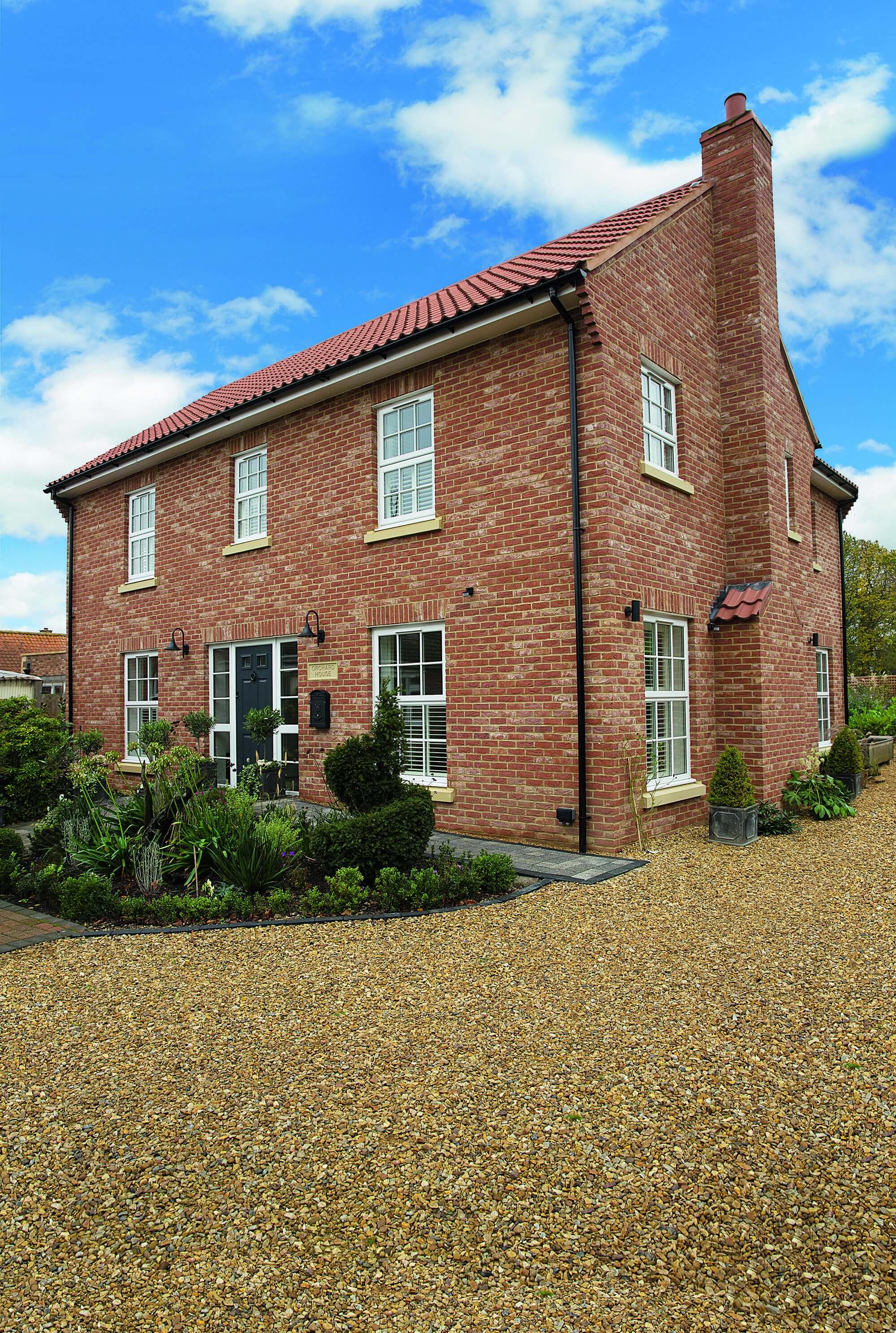 Brick clad timber-frame house