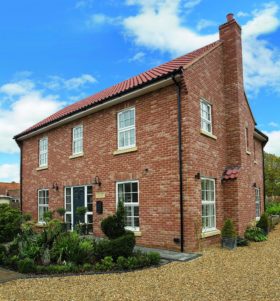 Brick clad timber-frame house