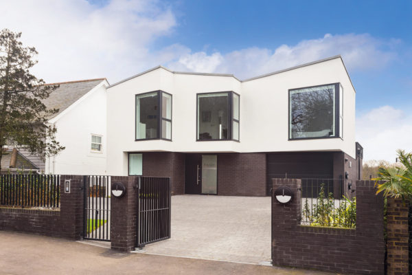 Modern white three-story house