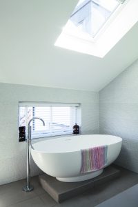 Simple bathroom with freestanding bath