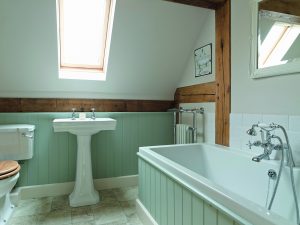 Simple light green bathroom