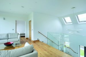 Glass staircase with wooden flooring