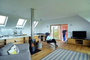 Open living space with woodburning stove