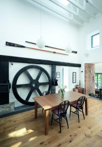 Wooden floored kitchen with boating parag