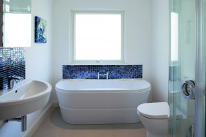 Simple bathroom with blue tiles
