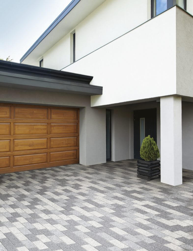 narrow tiles make patterned driveway