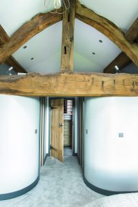 Oak frame doorway Exposed brick lounge in barn conversion
